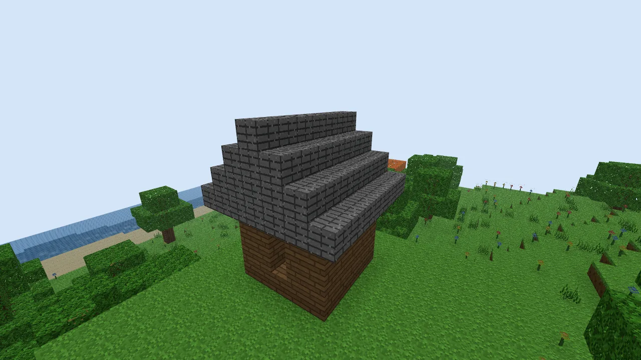 A five-block-wide oak building under a stepped stone-brick roof, with a central ridge.